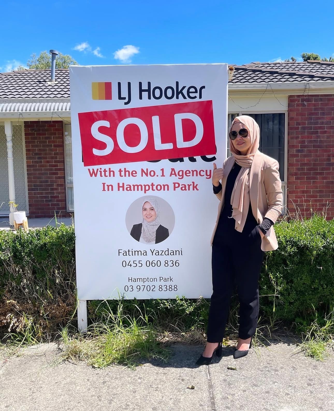 Fatima Yazdani beside a SOLD board in Hampton Park.